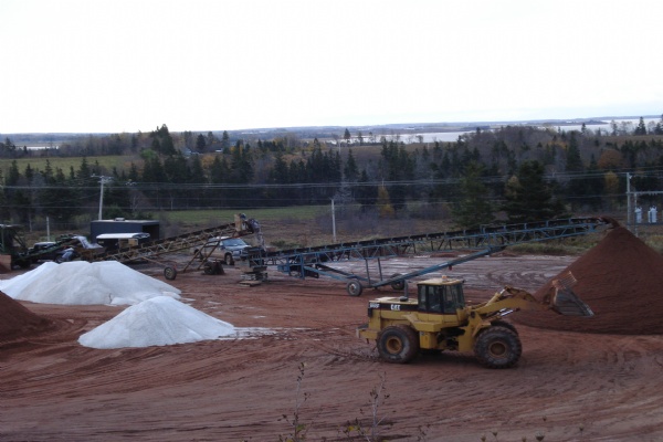 Blending Winter Sand, a salt sand mixture for winter ice control.